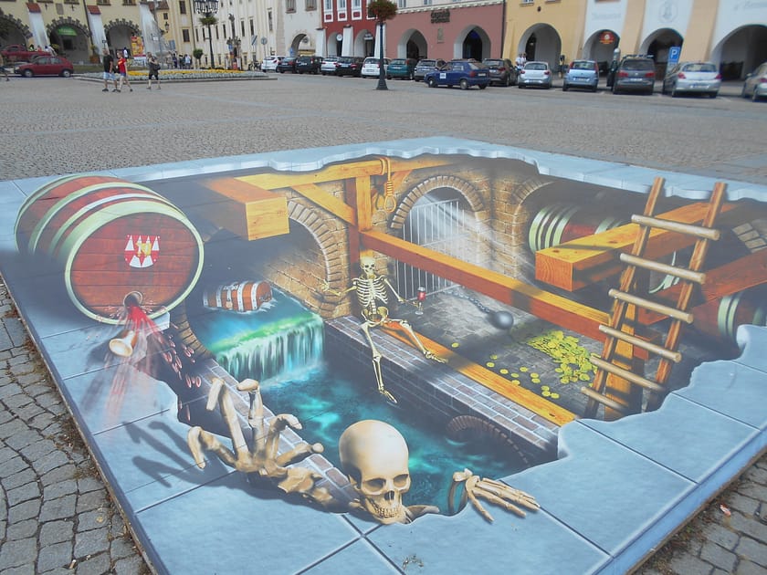 Escultura d’art urbà a la plaça de Kroměříž, amb edificis històrics i ambient cultural al voltant
